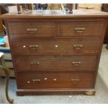 A 1.12m Edwardian mahogany chest of two short and three long graduated drawers, set on plinth base -