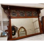 A1.1m Art Nouveau walnut framed overmantel mirror with scroll supports to shelf top, four inset