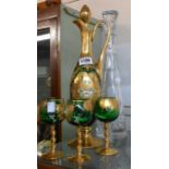 A vintage Murano green glass decanter and three glasses, with gilt and enamel decoration - sold with