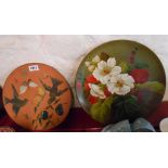 Four Watcombe Torquay terracotta plaques each with hand painted decoration depicting flowers, birds,
