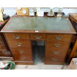 A 92cm 19th Century mahogany kneehole desk with sloping inset writing surface, three frieze