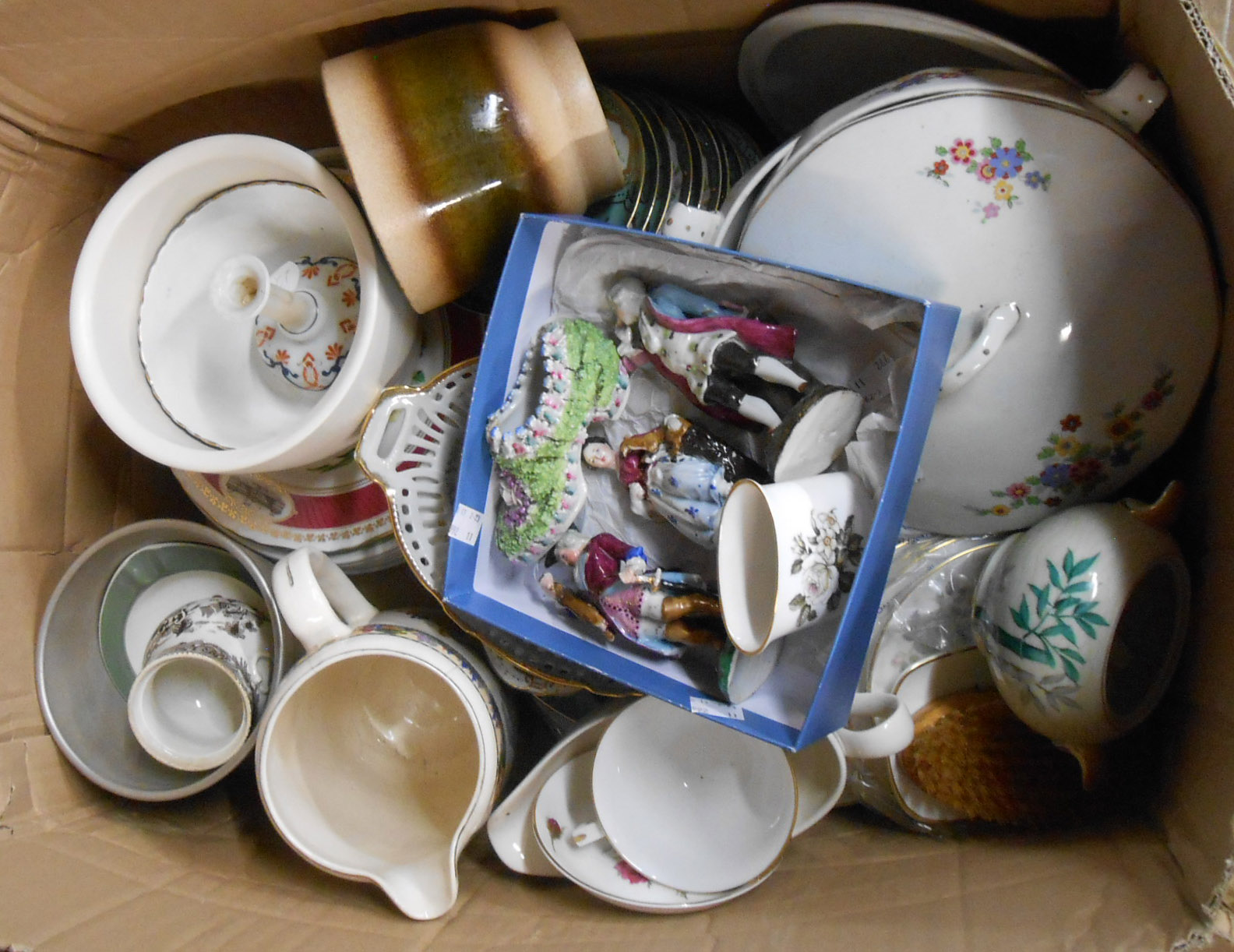 A box containing a large quantity of assorted ceramic items including jugs, plates, figurines, etc.