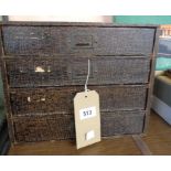 A vintage Eastlight four drawer collector's cabinet with faux snakeskin paper finish and metal