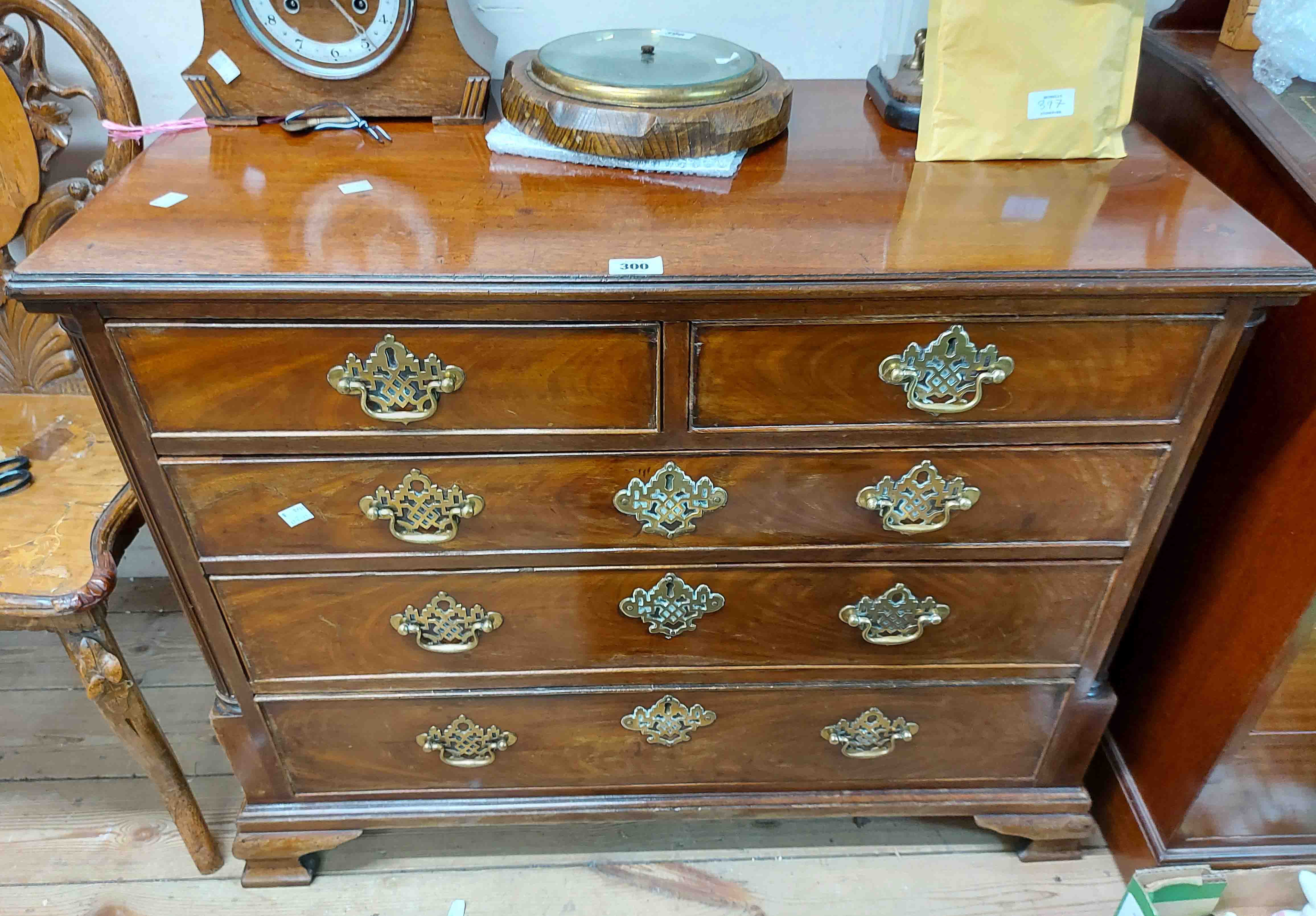 A 92cm late 18th Century mahogany chest of two short and three long graduated drawers with pierced