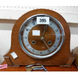 A vintage oak cased mantel clock, with English eight day gong striking movement