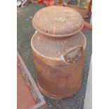 A vintage two handled milk churn with lid
