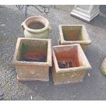 A set of three small square terracotta planters - sold with a two handled stoneware urn