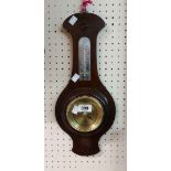 A vintage stained wood framed banjo barometer by Shortland Bros., with aneroid works and thermometer
