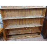 A 1,65m old pine dresser top with four open shelves and waterfall sides