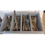 A plastic cutlery tray containing a quantity of silver plated cutlery including thread pattern and