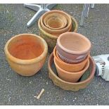 A selection of assorted terracotta and other garden pots