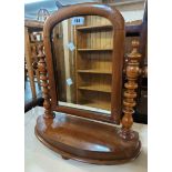A Victorian mahogany platform dressing table mirror with arch top and flanking bobbin turned