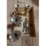 A small box containing a quantity of assorted brassware including Victorian candlesticks, Chinese