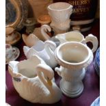 A quantity of Dartmouth pottery including swan planters, vases, etc. - sold with a SylvaC swan