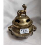 A 19th Century Chinese cast brass censer and lid with moulded elephant head, loop handles and chased