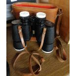 A pair of vintage Carton 10x50 binoculars in original leather case
