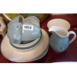 A Royal Doulton part tea set in the Spindrift pattern comprising four trios, milk and sugar and