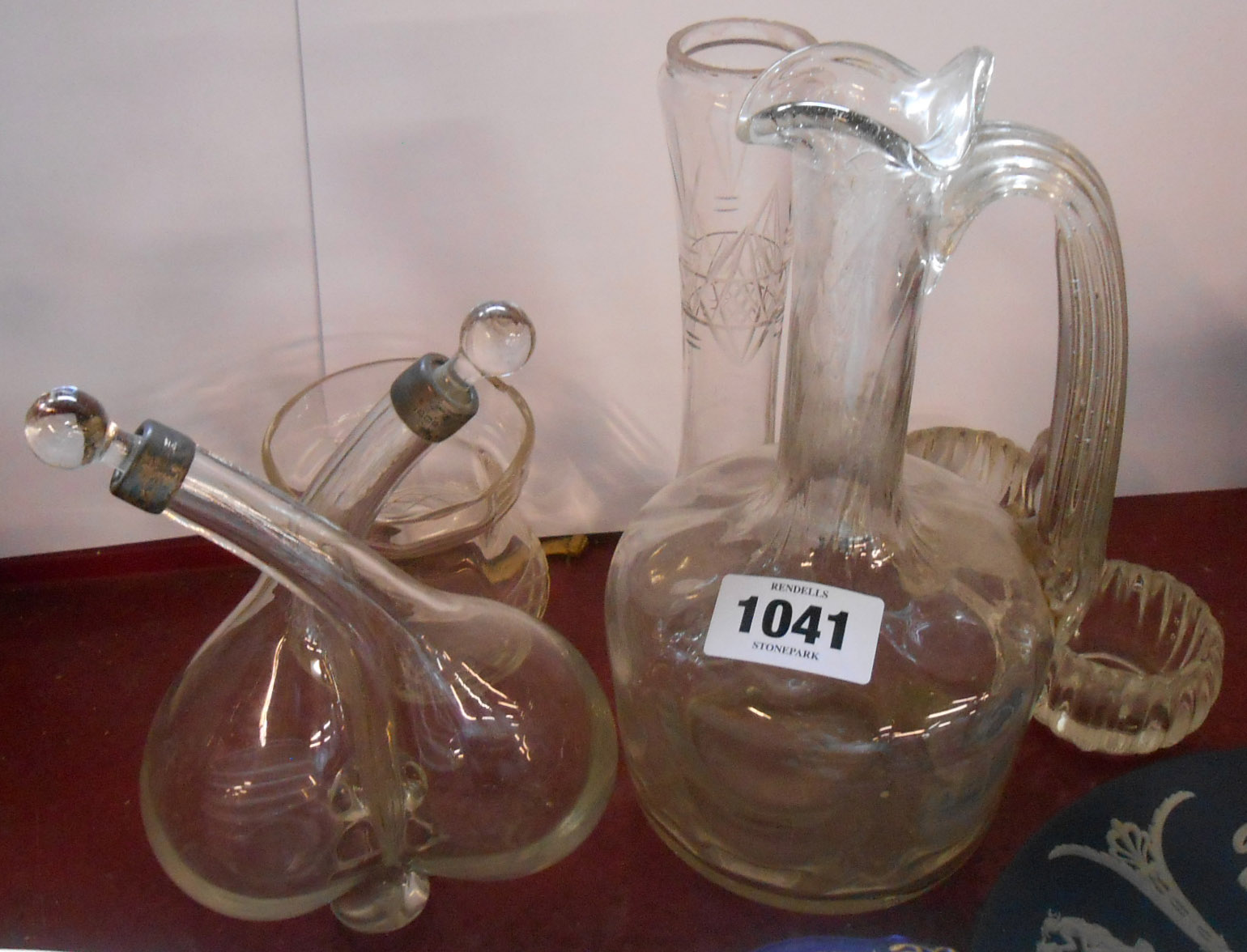 An old glass double pour oil and vinegar bottle with silver collars - sold with a quantity of