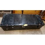 A vintage Royal Navy officer's tin trunk with black japanned finish and keys