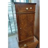 An antique walnut pot cupboard with single drawer and cupboard under, set on quadruple stepped
