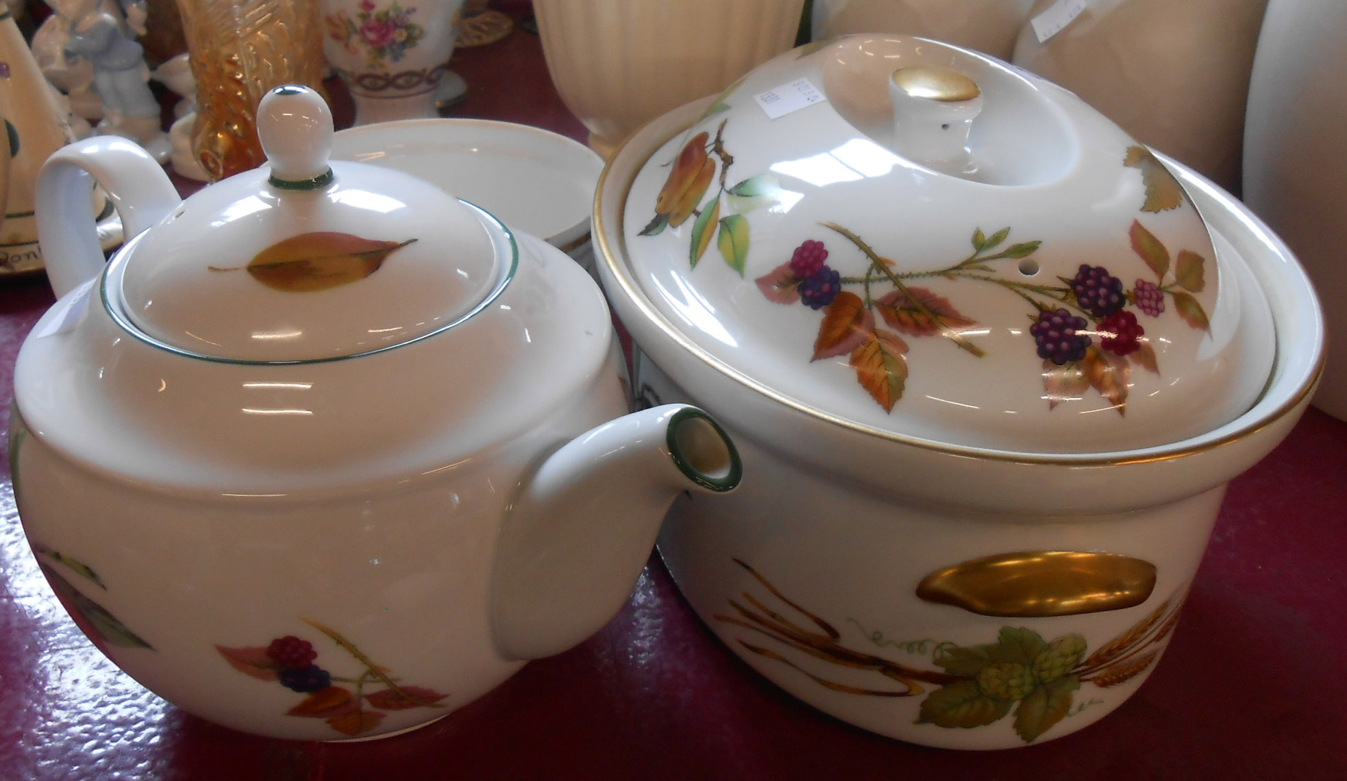 Three pieces of Royal Worcester Evesham oven-to-table ware comprising oval casserole, teapot and