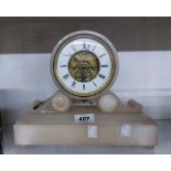 A Victorian alabaster drum and scroll mantel timepiece with visible works to dial centre and