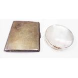 A silver circular compact case with gilt interior and mirror - sold with a silver cigarette case,