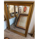 A old gilt framed oblong wall mirror with reeded border