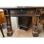 A 1.7m antique stained walnut and mixed wood fire surround with central decorative frieze and