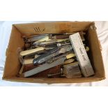 A box containing a quantity of silver plated items including cased and loose cutlery