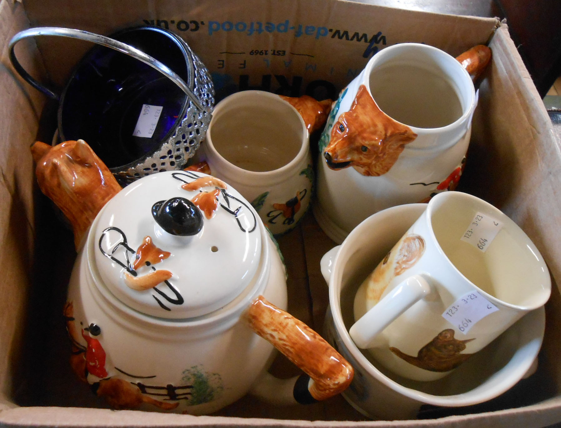 A box containing a small quantity of ceramic items including hunting pattern tea set, etc.