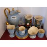 An Art Deco period part coffee set comprising coffee pot, cream and sugar, two coffee cans and