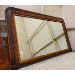 A 90cm Victorian inlaid rosewood framed overmantel mirror with Tonbridge style decoration, set on