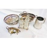 A small quantity of silver plated items including two pierced dishes, four bottle cruet and gravy