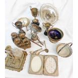 A box containing a quantity of silver plated items including egg cruet, trophy cups, etc.
