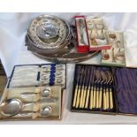 A box containing a quantity of silver plated items including baskets, gallery tray and cased