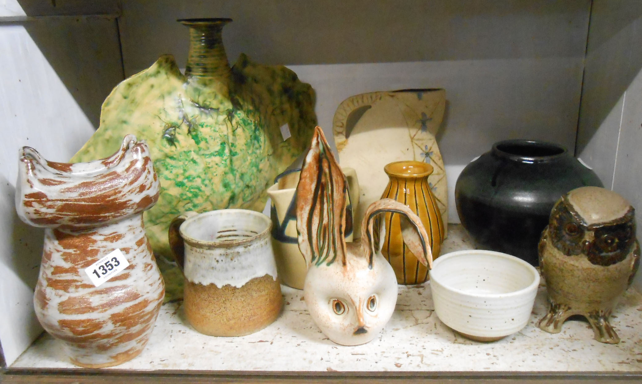 A quantity of studio pottery items including vases, jug, mugs, etc.