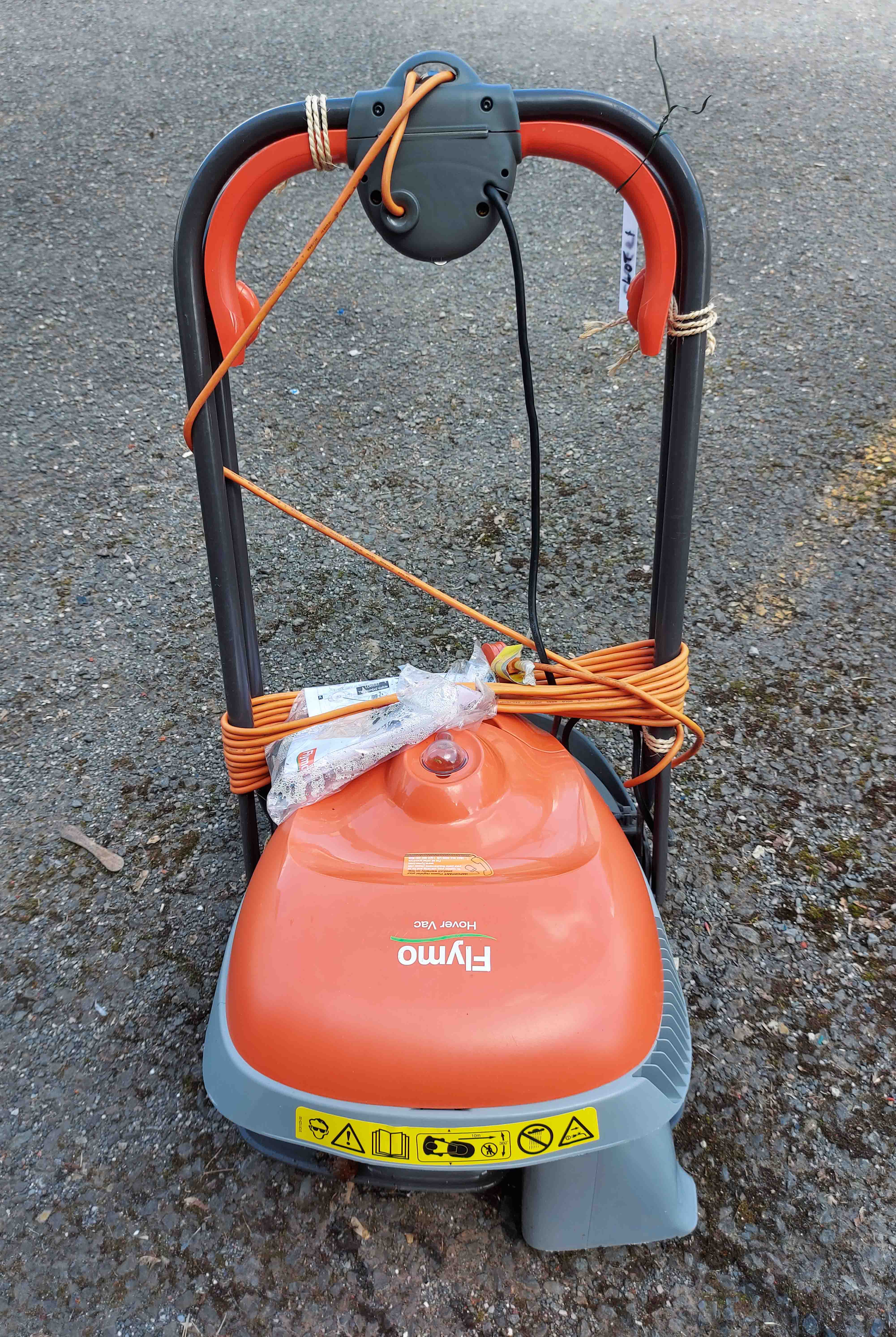 A Flymo Hover Vac lawn mower