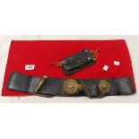 A 19th Century military leather strap belt set with badge for the 1st Surrey Rifles and brass