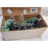 A box containing six small chemist/apothecary bottles