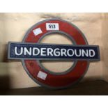 A modern painted cast iron London Underground sign