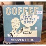 A modern printed tin coffee advertising sign