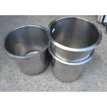 Three stainless steel litter bins