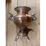 A 19th Century copper samovar with brass fittings and milk glass handles - lid missing and tap