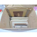A box containing a collection of late Victorian and later photographs including posed portraiture,
