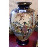 A large Japanese late satsuma vase with decorative panels depicting ladies within a landscape on a