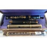 A vintage ebony flute marked for V. Kohlert Sons, Graslitz in original case - sold with a similar