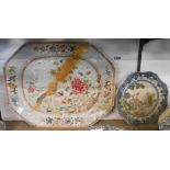 An antique Chinese export porcelain large meat platter decorated in the famille rose palette with