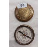 A modern reproduction brass compass with apocryphal mark London 1953