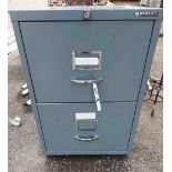 A metal two drawer filing cabinet with grey painted finish